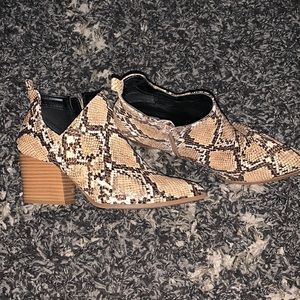 Size 7 1/2 Qupid bootie heels.